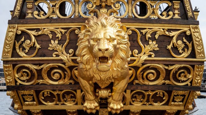 Close detail of restored gilded lion carving and stern gallery of the Vasa warship
